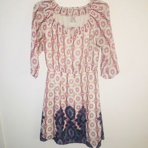 Small dress with 3/4 inch sleeves , very dainty